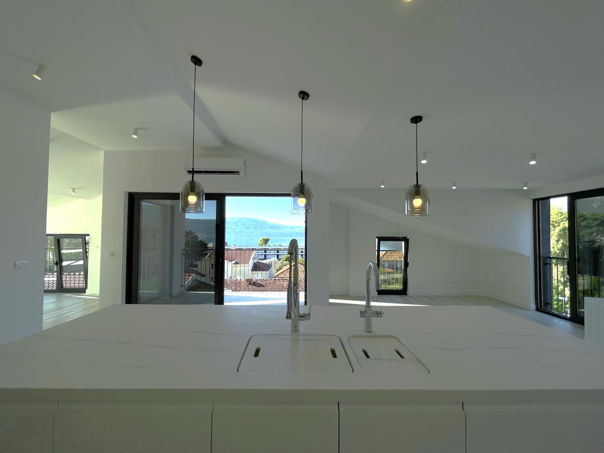 Exclusive 2-bedroom apartment with a sea view in Tivat for sale 12