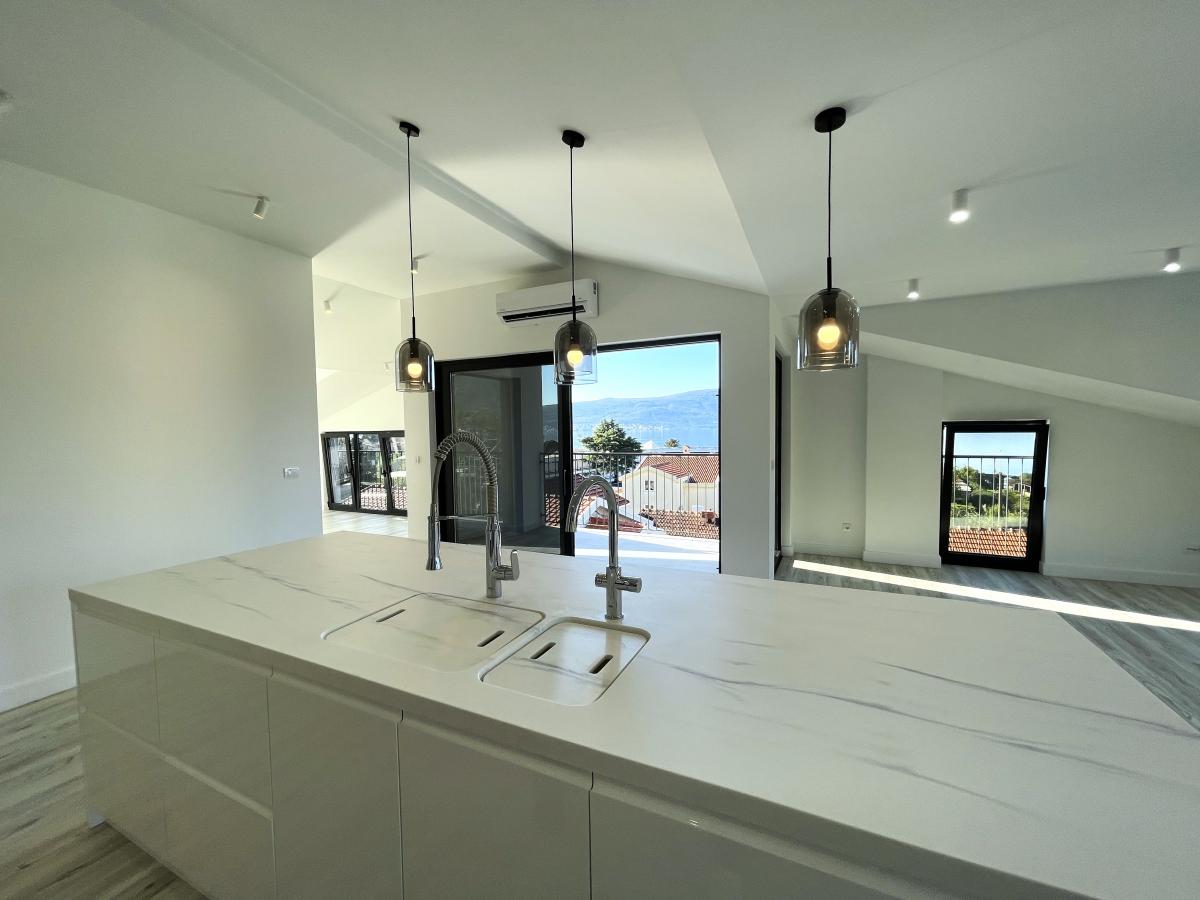 Exclusive 2-bedroom apartment with a sea view in Tivat for sale 13