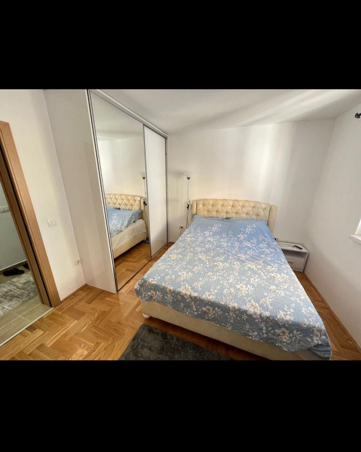 Fully furnished 3-bedroom apartment with a sea view in Budva for sale 6