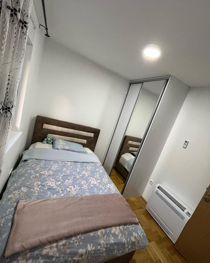 Fully furnished 3-bedroom apartment with a sea view in Budva for sale 7