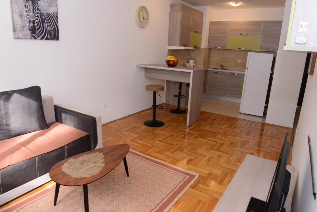 Modern 1-bedroom apartment in an excellent location in Budva for sale 11