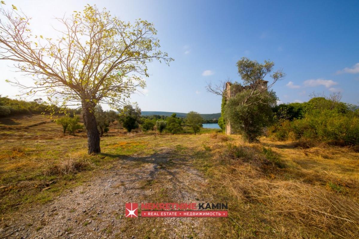 Exclusive Investment Opportunity: 18000m2 on the Seafoam: Urbanized Land First Row to the Sea in Tivat 4