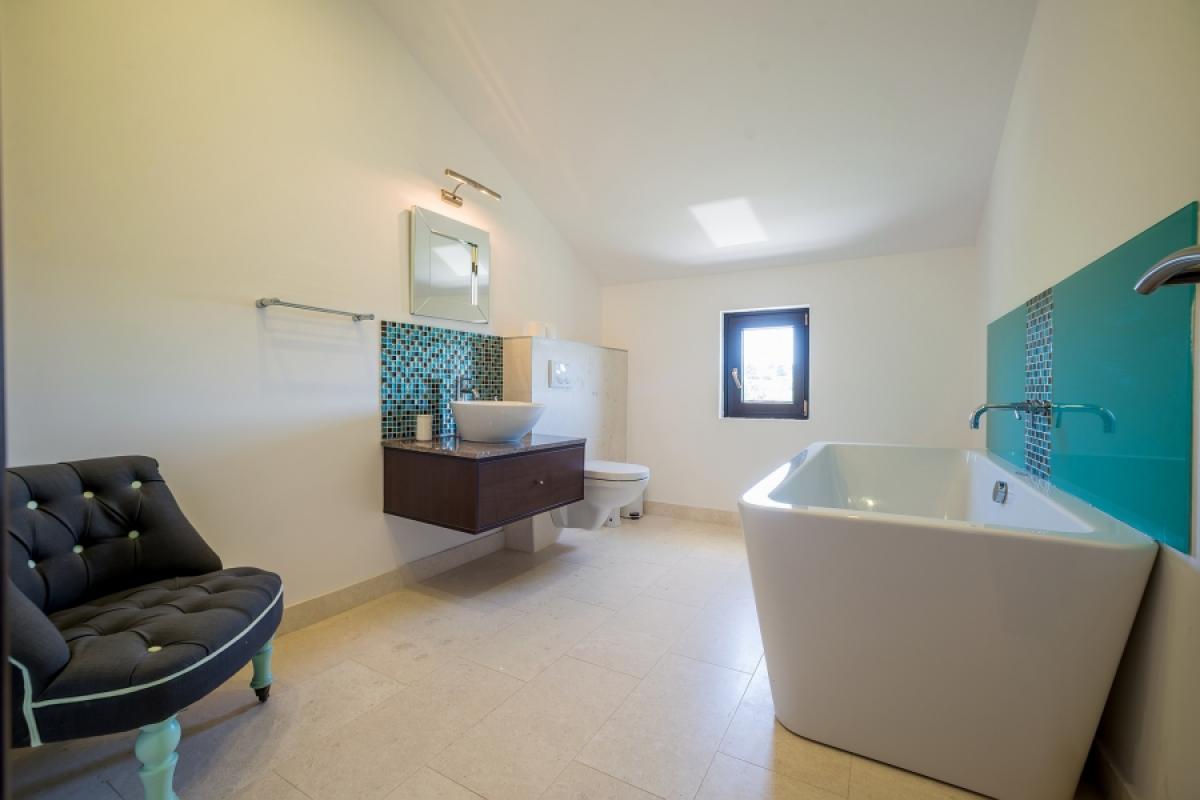 For sale is a recently renovated, stylishly designed villa 13