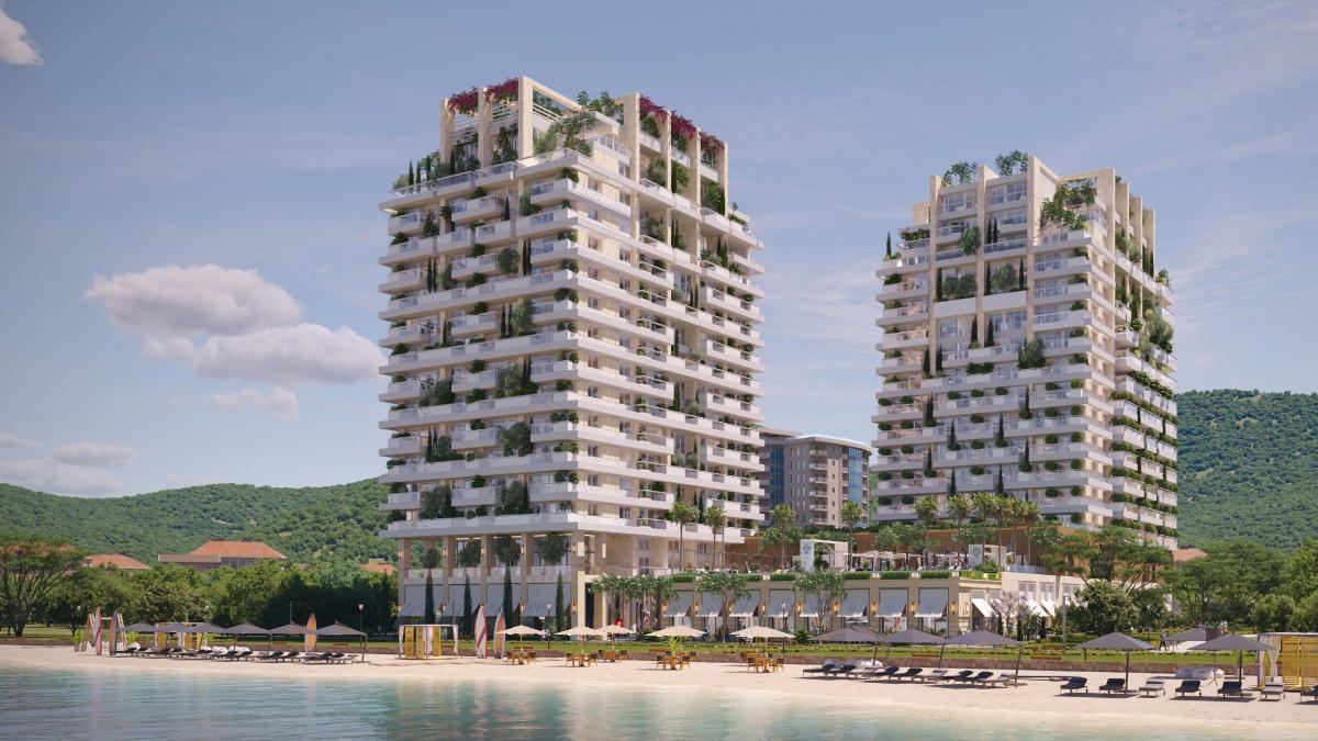 Luxury hotel with 212 residences, 144 rooms, and prime location near beach & city center 4
