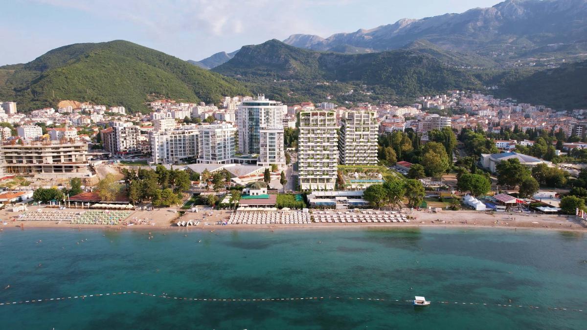 Luxury hotel with 212 residences, 144 rooms, and prime location near beach & city center 18
