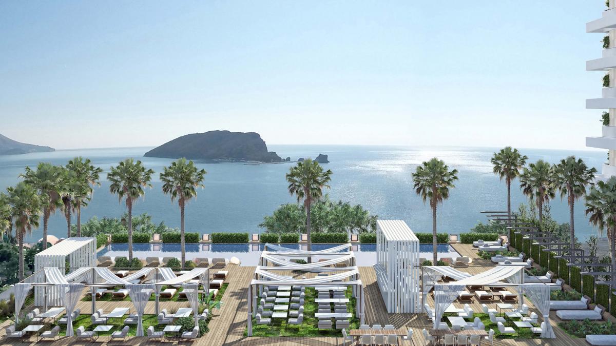 Luxury hotel with 212 residences, 144 rooms, and prime location near beach & city center 3
