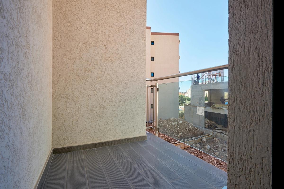 2 bedroom apartment 63m2 in a new building in Becici 11
