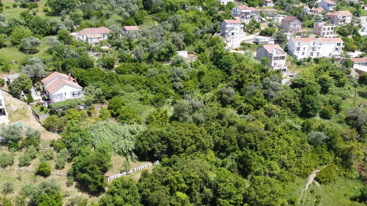 Plot in Tivat 1430 m2 with an approved project for the construction of 2 residential buildings 6