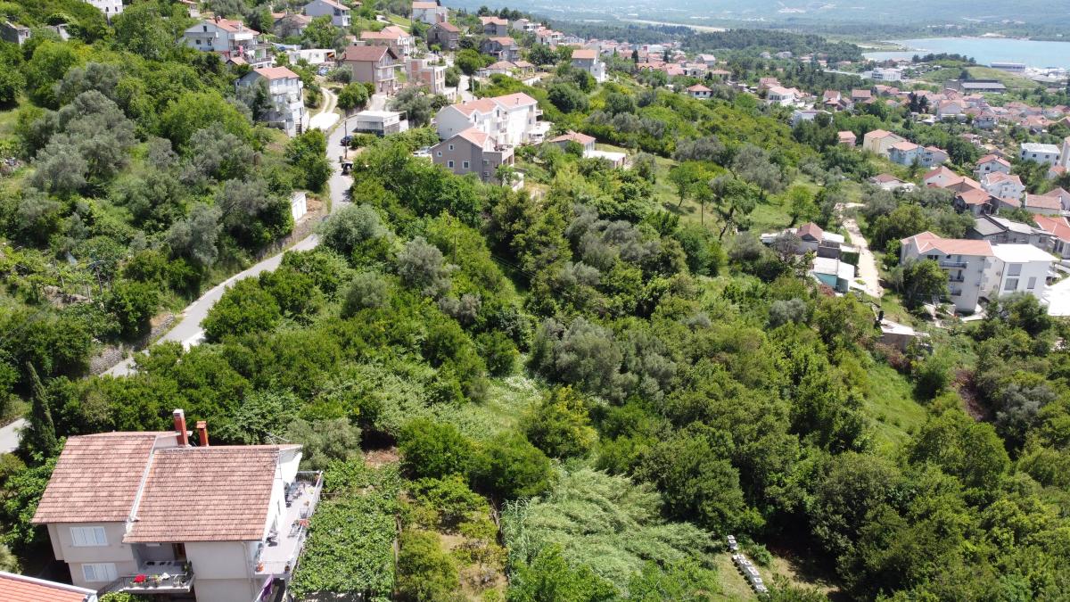 Plot in Tivat 1430 m2 with an approved project for the construction of 2 residential buildings 7