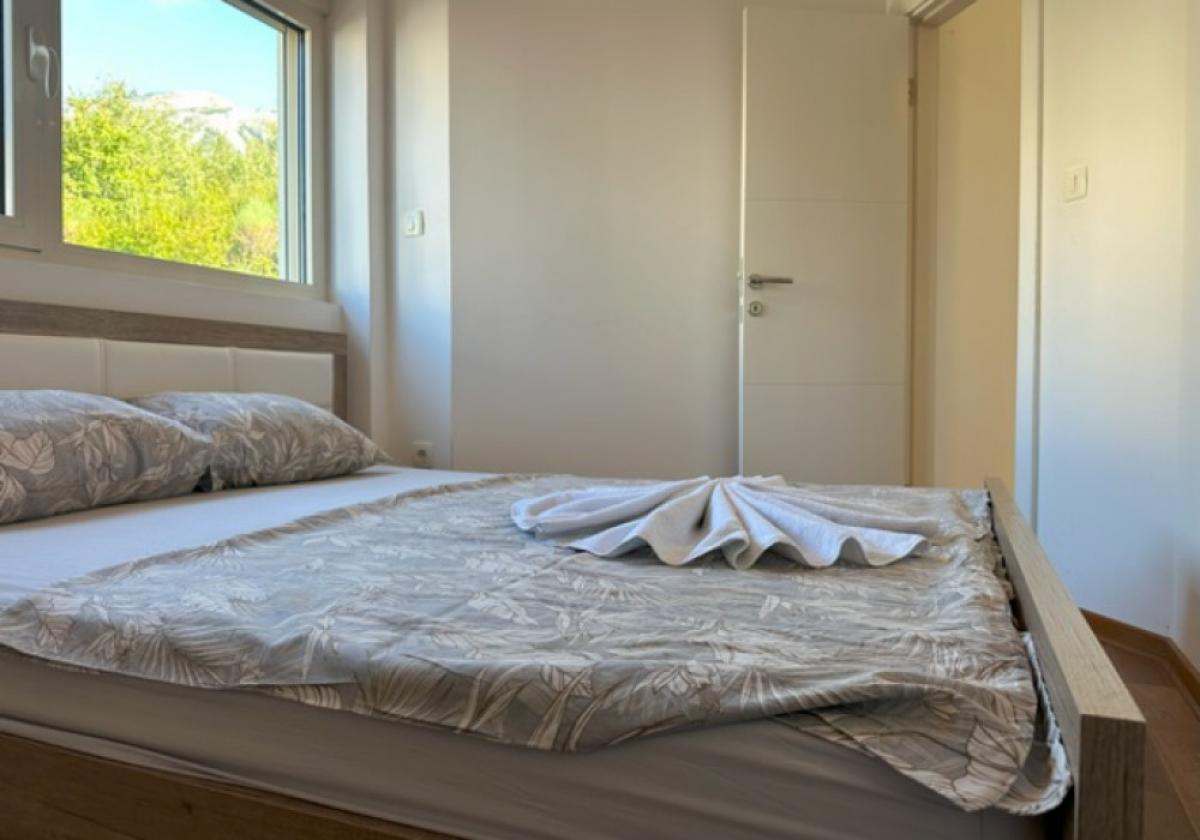 Two bedroom apartment 69m2 in Rafailovici 12