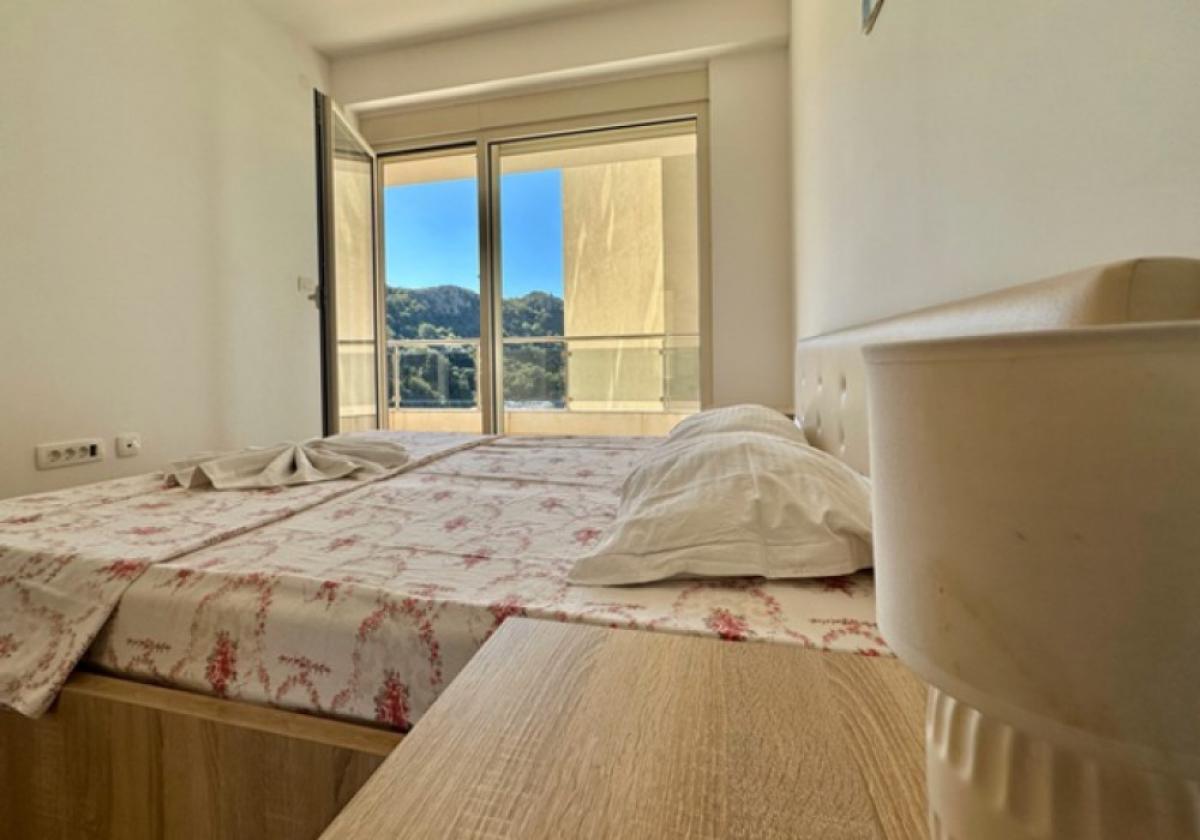 Two bedroom apartment 69m2 in Rafailovici 13