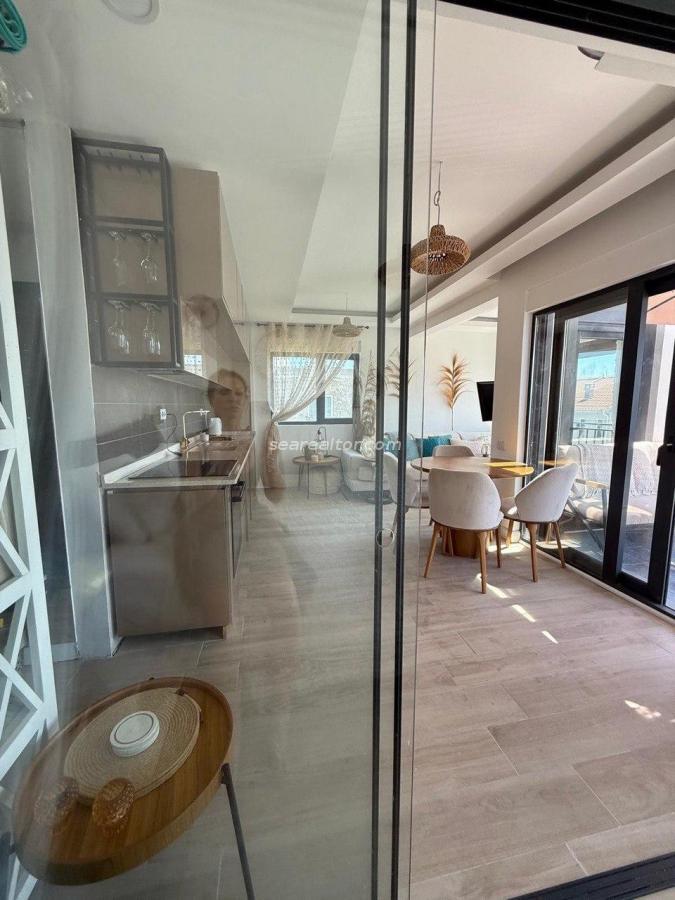 Modern two-bedroom apartment with panoramic sea views in Tivat 12