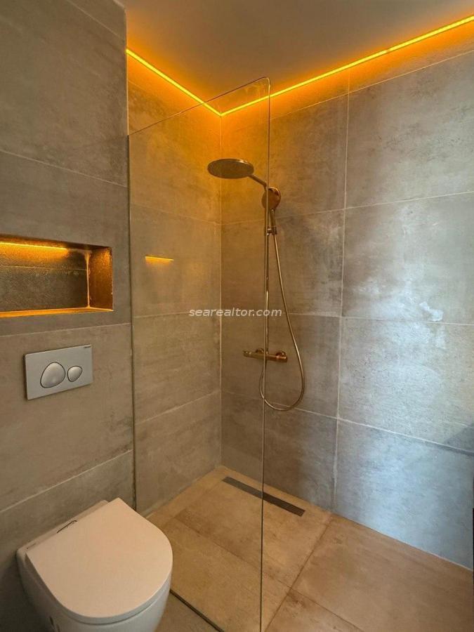 Modern two-bedroom apartment with panoramic sea views in Tivat 17