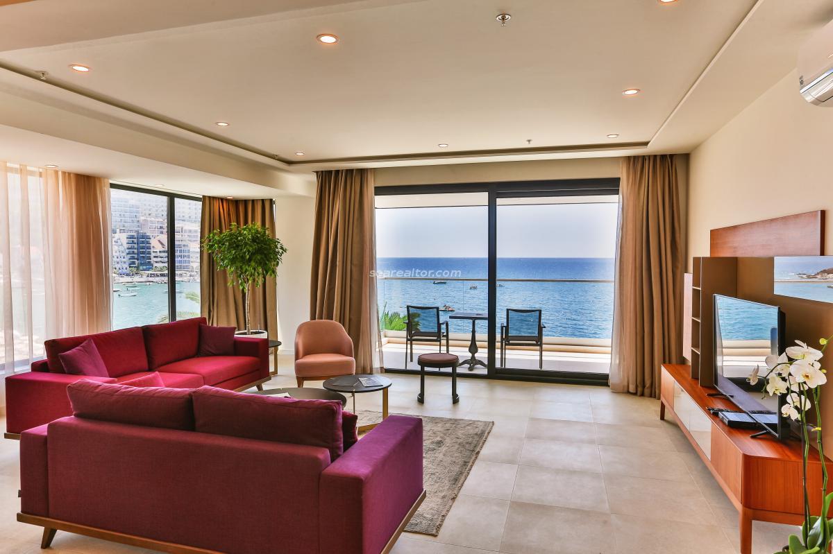 Three-bedroom apartment with a panoramic view of the sea in Rafailovići 2
