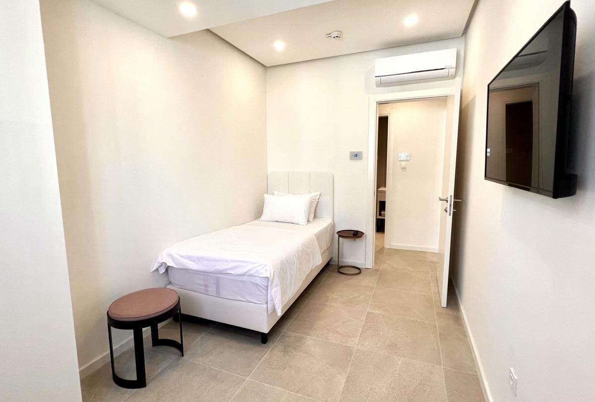 Three-bedroom apartment with a panoramic view of the sea in Rafailovići 9